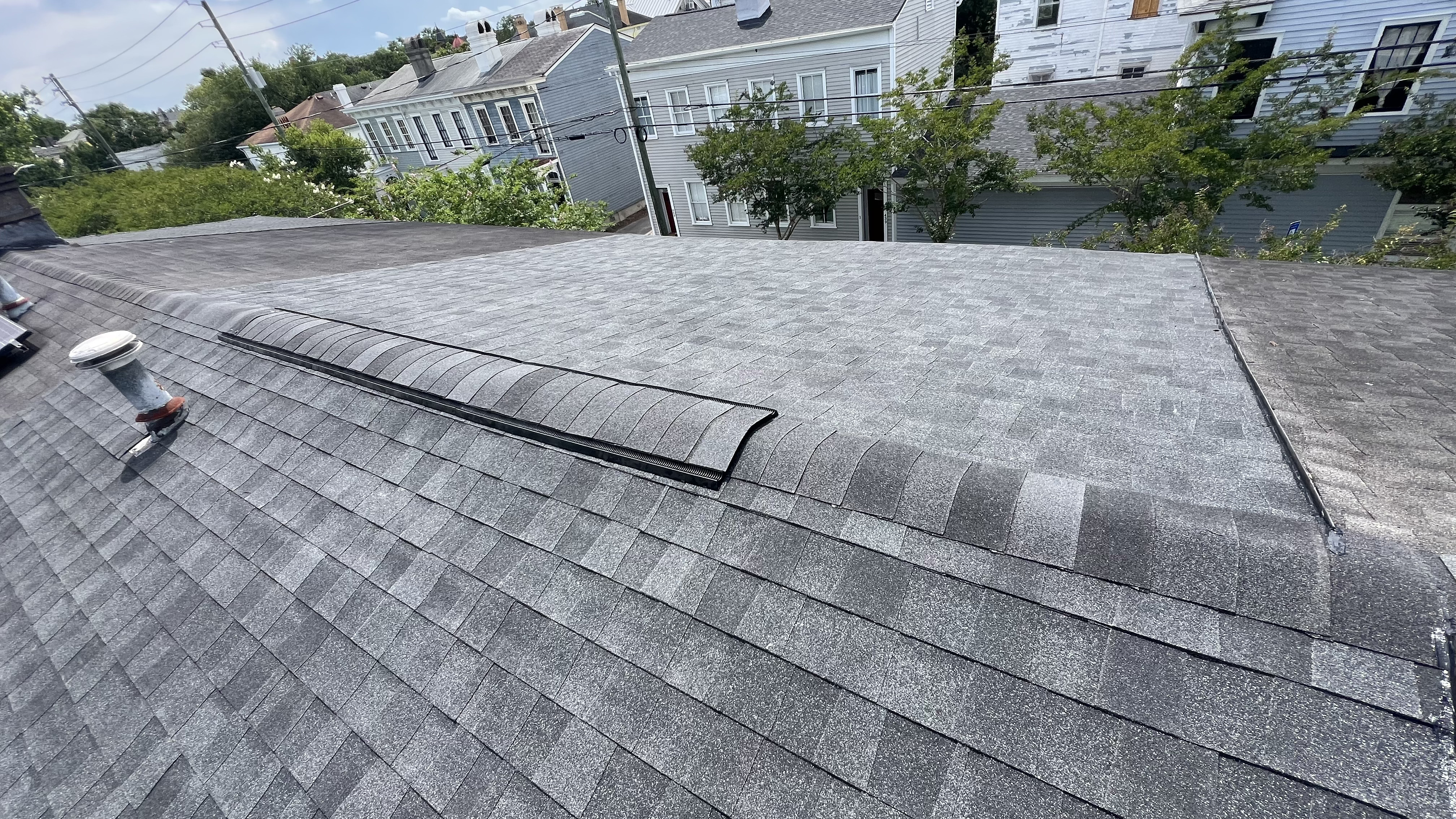 Completed shingle roof by Port Side Roofing & Remodeling